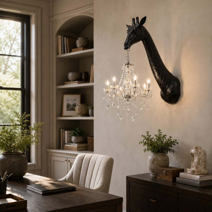 Black Nuvexa giraffe wall lamp with a large silver crystal chandelier in a traditional home office