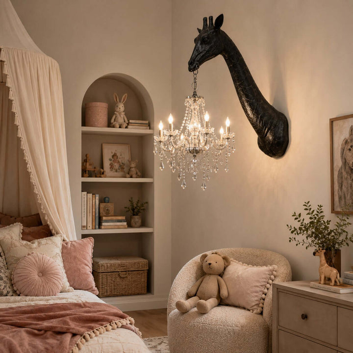 Black Nuvexa giraffe wall sconce with a silver crystal chandelier in a softly decorated kids bedroom