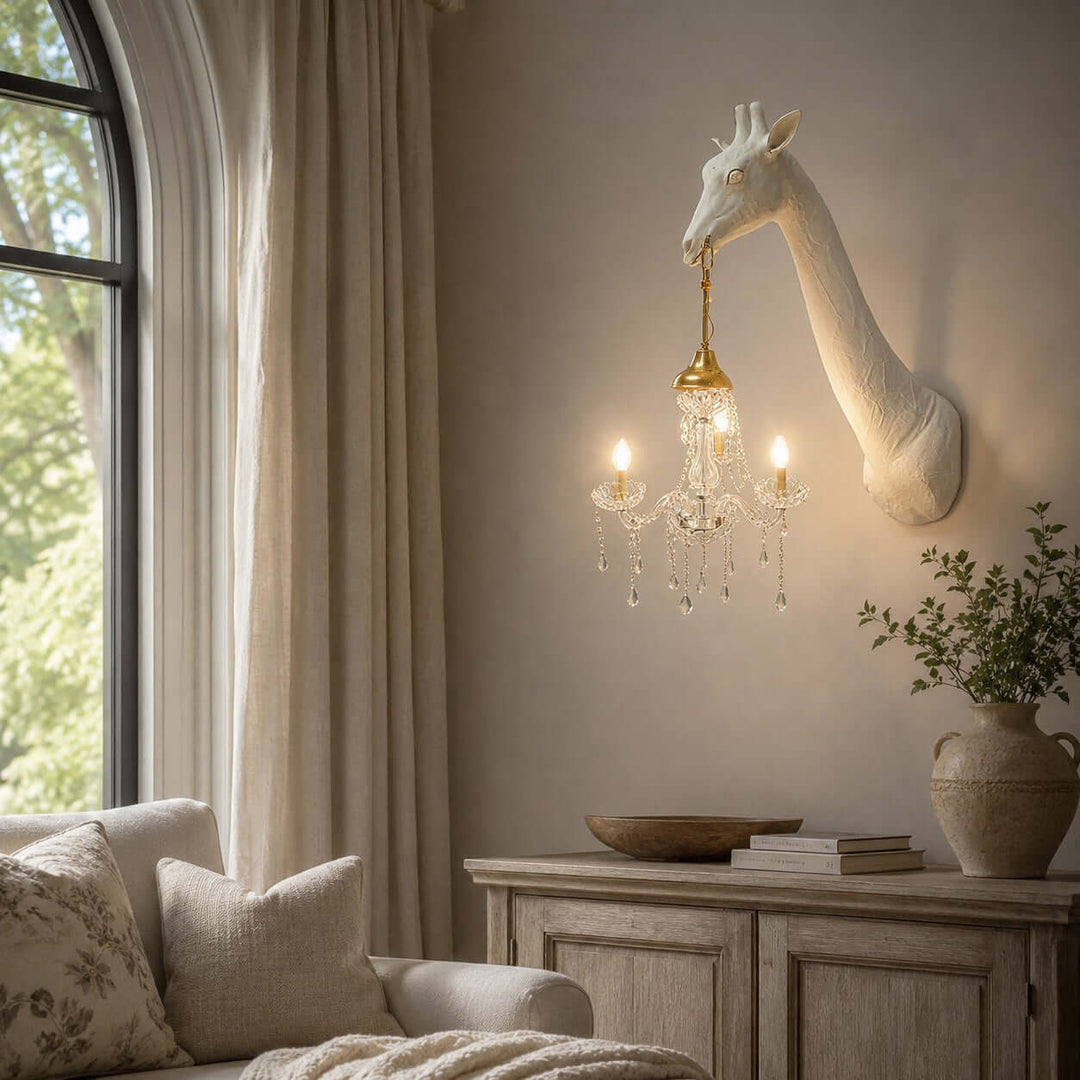 Nuvexa white giraffe wall lamp beside an arched window and wood console in a neutral living room