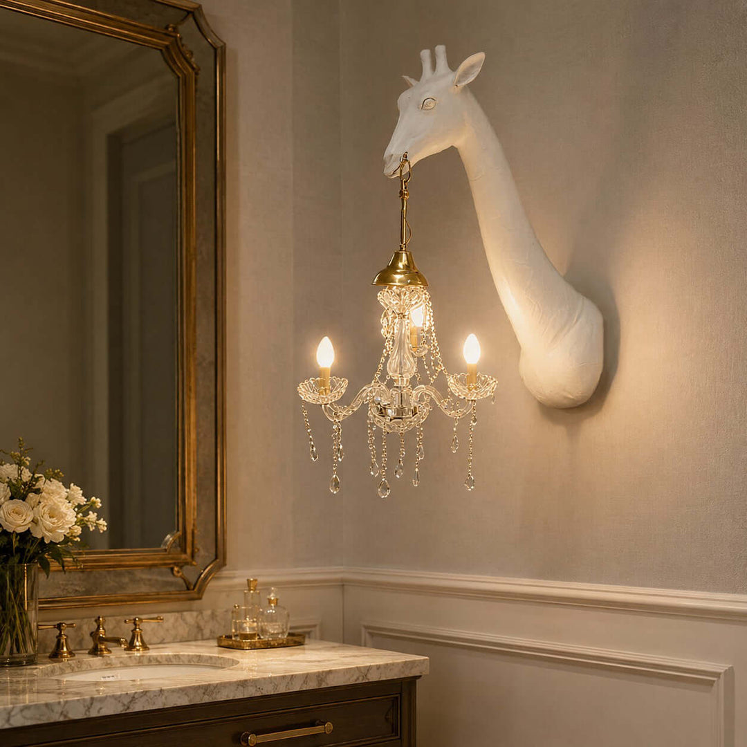 Nuvexa white and gold giraffe wall lamp illuminating an elegant bathroom vanity and framed mirror