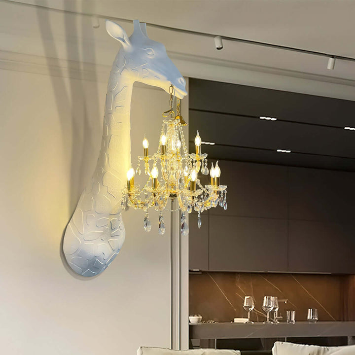 Large white and gold Nuvexa giraffe wall lamp with a multi-light crystal chandelier in a modern interior