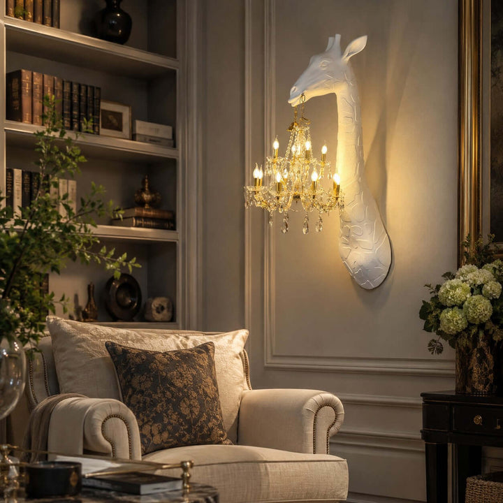 White Nuvexa giraffe wall lamp with a gold crystal chandelier in a traditional reading room with built-in shelves