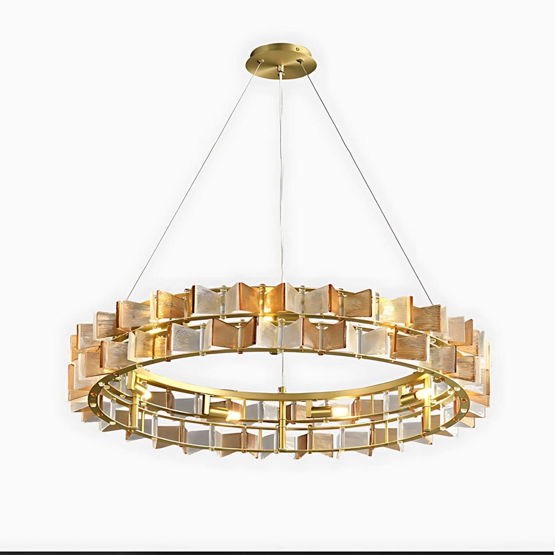 Close product view of the amber Orvex round chandelier highlighting its illuminated glass panels