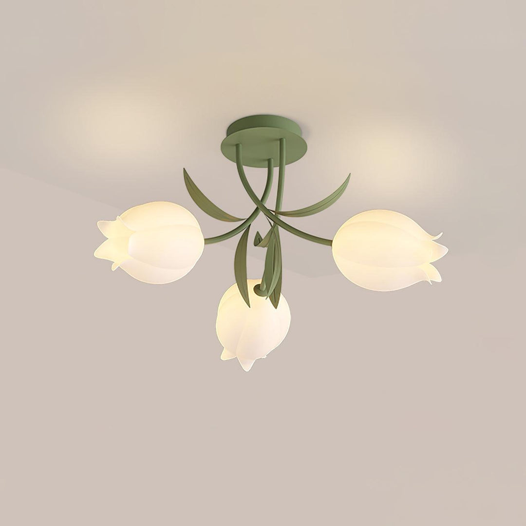 Three-light Ricko green ceiling fixture with cream lily-shaped shades viewed from below.