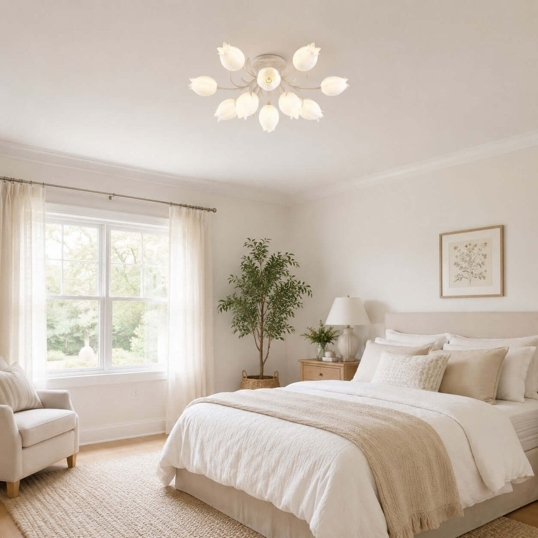 Ricko white floral ceiling light in a spacious neutral bedroom with a large window and potted tree.