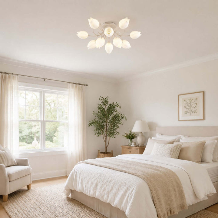 Ricko white floral ceiling light in a spacious neutral bedroom with a large window and potted tree.