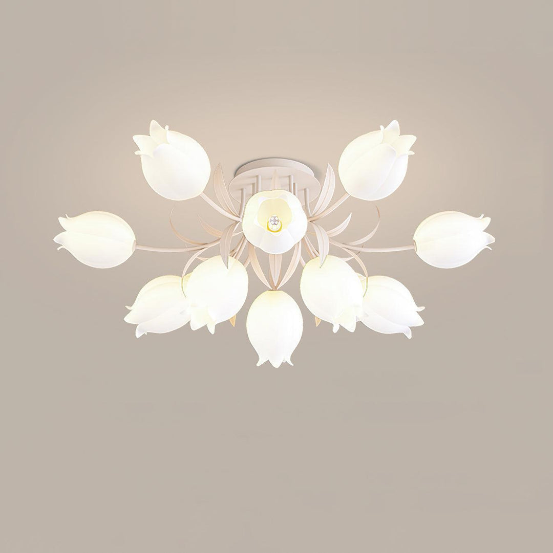 Large Ricko white ceiling light with radiating flower shades and leaf details viewed from directly below.