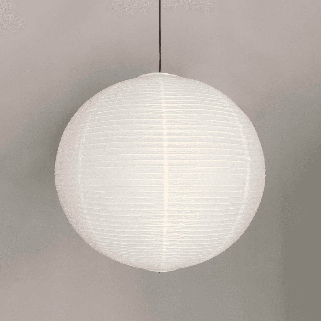 Front view of an unlit round white rice paper lantern with horizontal ribs