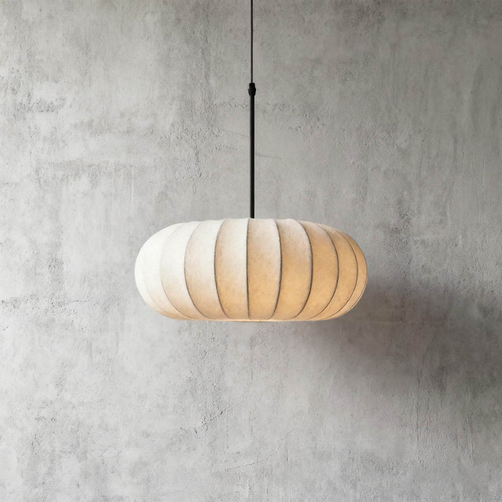Small Verona silk pendant light in the 11.8-inch size against a gray wall