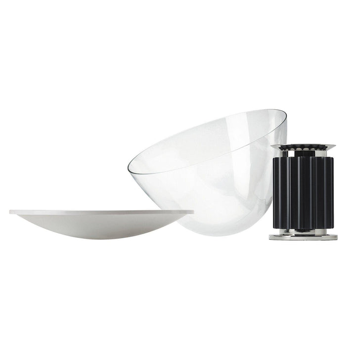 Disassembled Taccia table lamp components showing the clear glass shade, white diffuser and black base