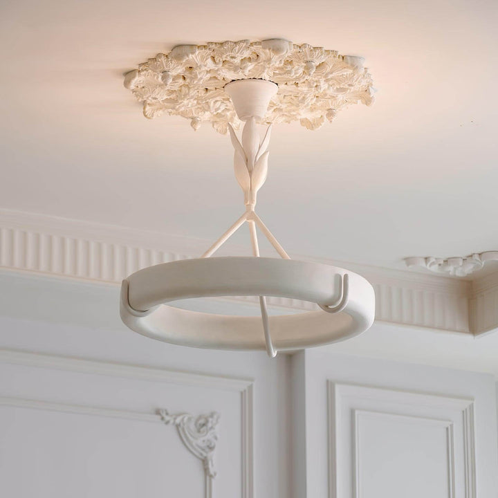 Full view of the Tinsley plaster chandelier installed beneath an ornate floral ceiling medallion.