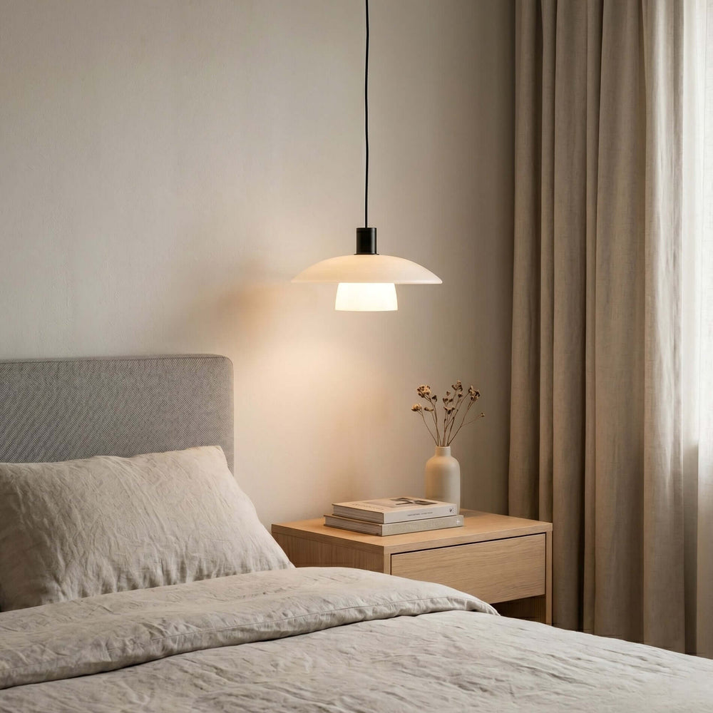 Verona pendant lamp above a wood nightstand in a warm neutral bedroom