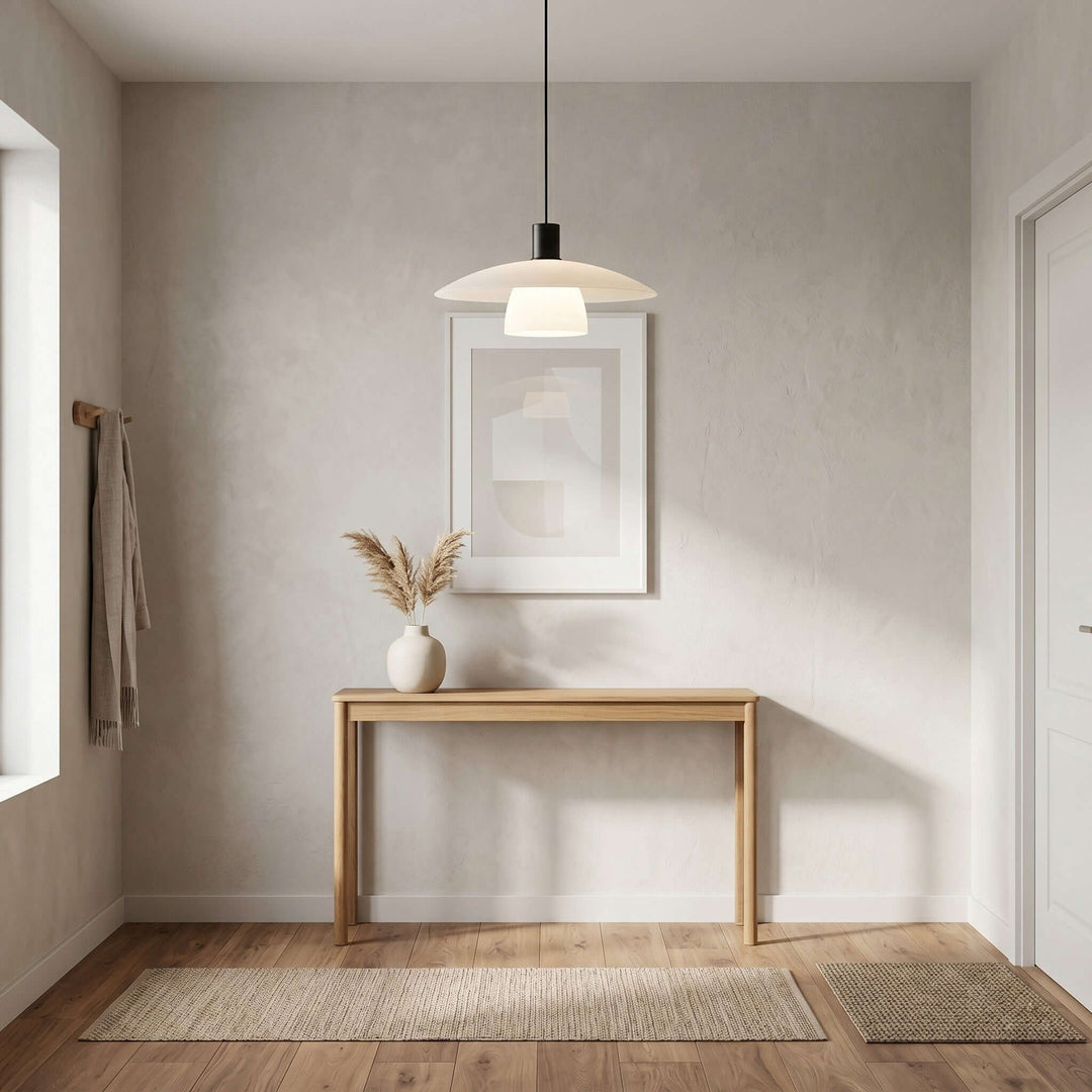 Verona pendant lamp above a slim wood console in a bright minimalist entryway