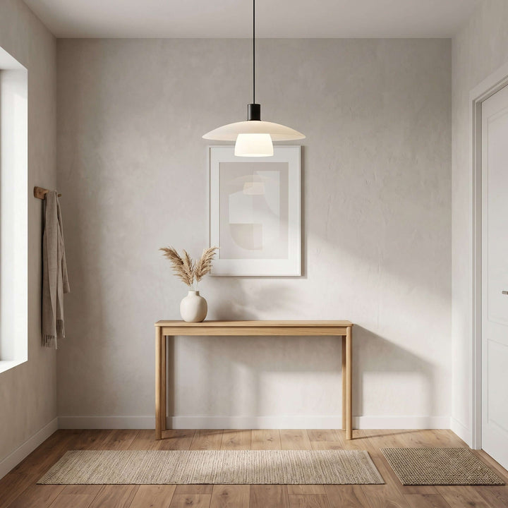 Verona pendant lamp above a slim wood console in a bright minimalist entryway