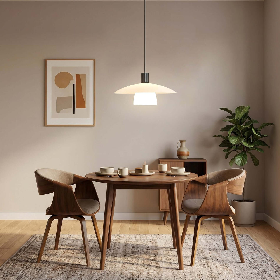 Verona pendant light above a round wood table in a warm modern dining room