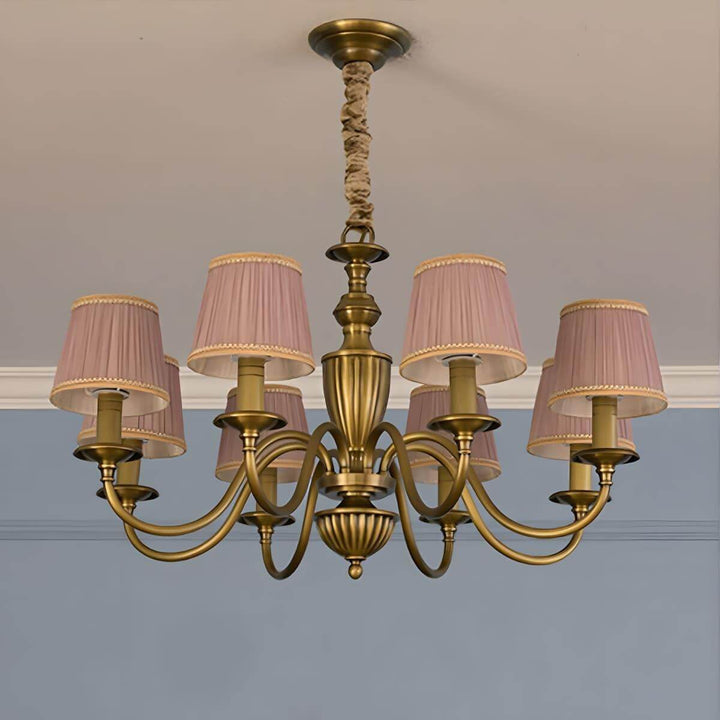 Eight-light Eryn chandelier with purple pleated shades and a brass frame.