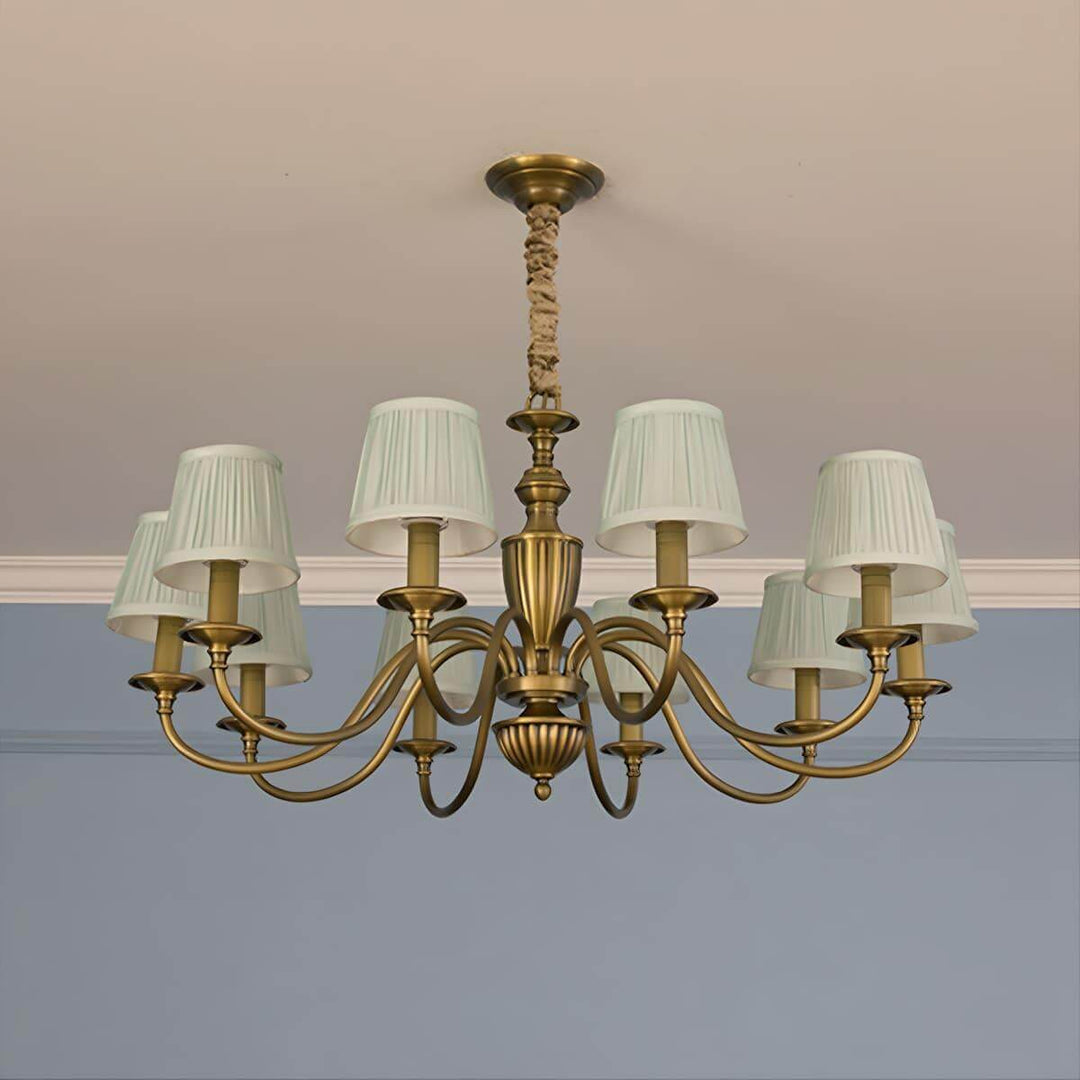 Ten-light Eryn chandelier with white shades and a brass frame.