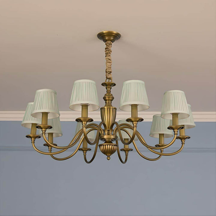 Ten-light Eryn chandelier with white shades and a brass frame.