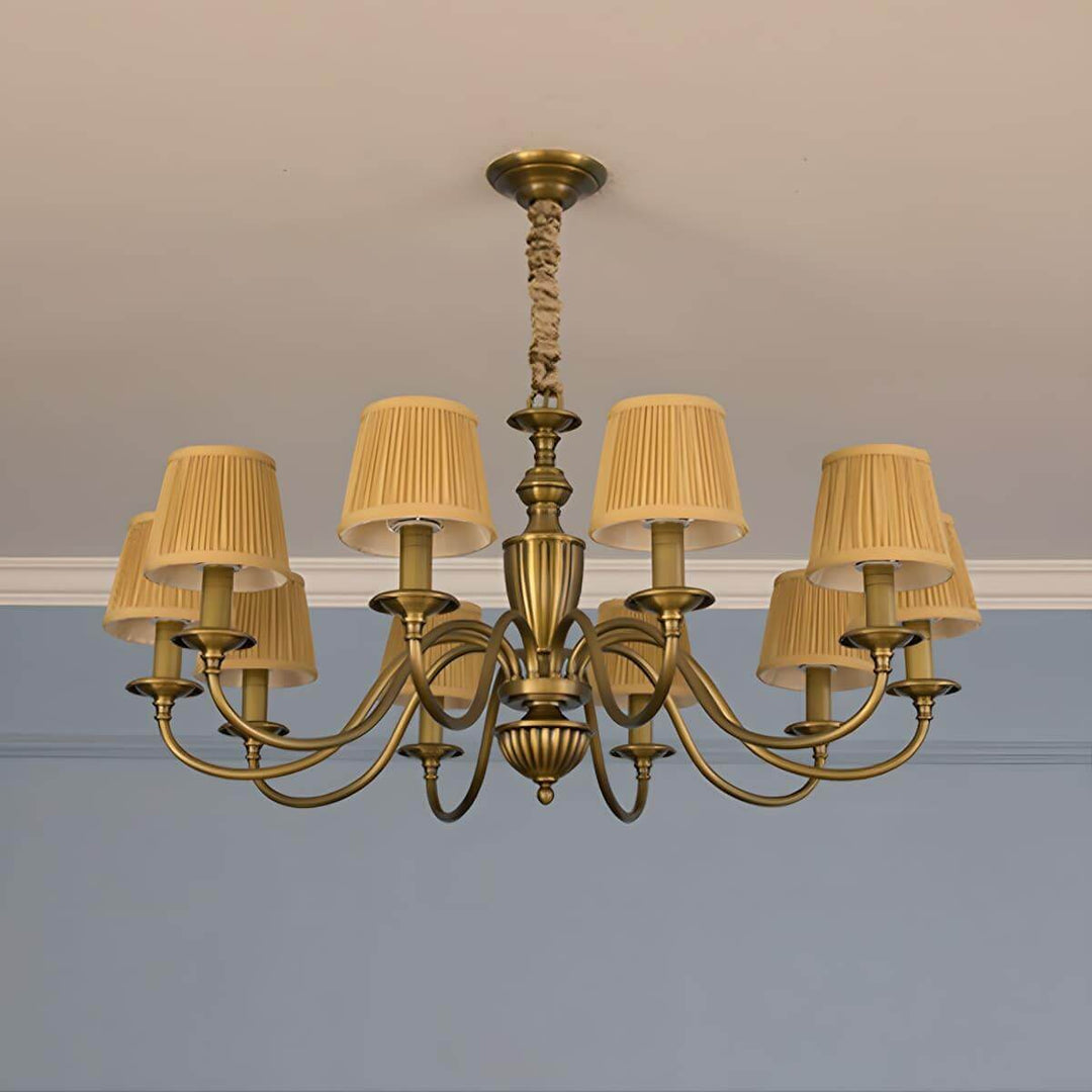 Ten-light Eryn chandelier with yellow pleated shades and a brass frame.