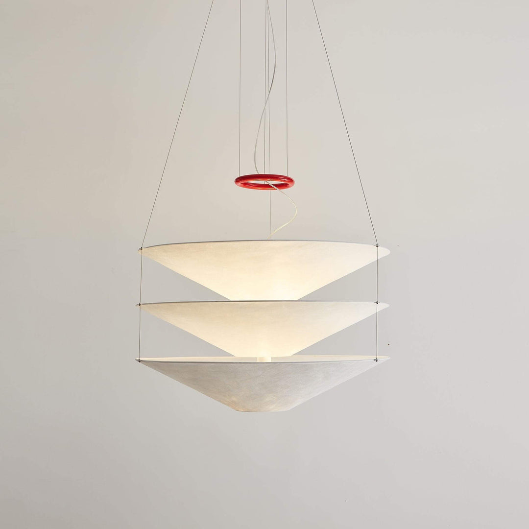 White layered pendant light shown from a lower front studio angle.