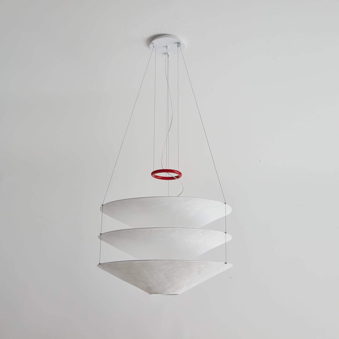 Side view of the white layered floating pendant light with a red ring accent.
