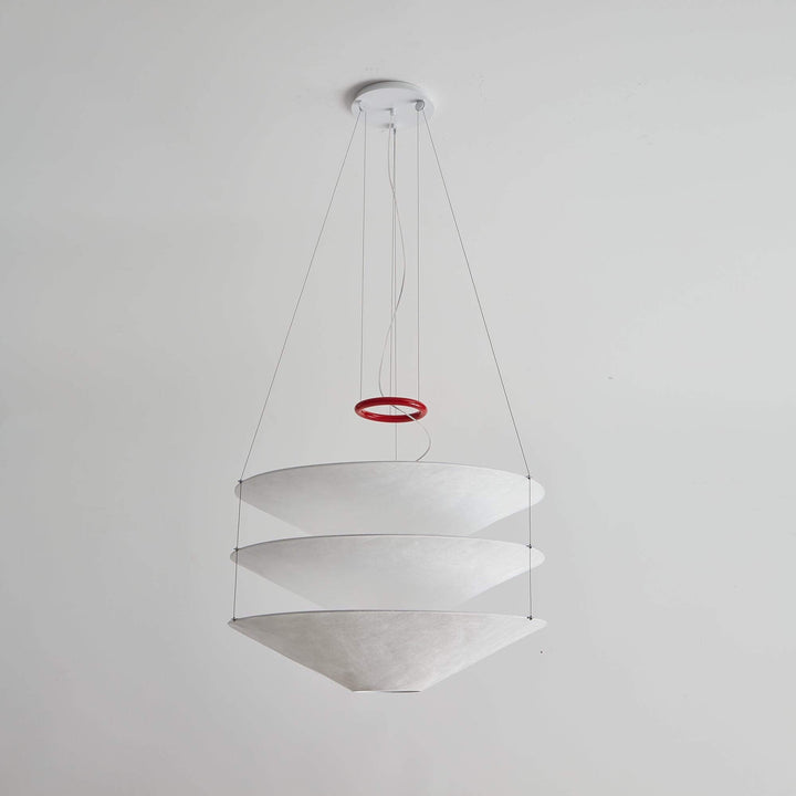 Side view of the white layered floating pendant light with a red ring accent.