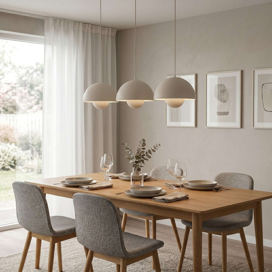 Beige gray Flowerpot pendant lamps shown above a dining table.