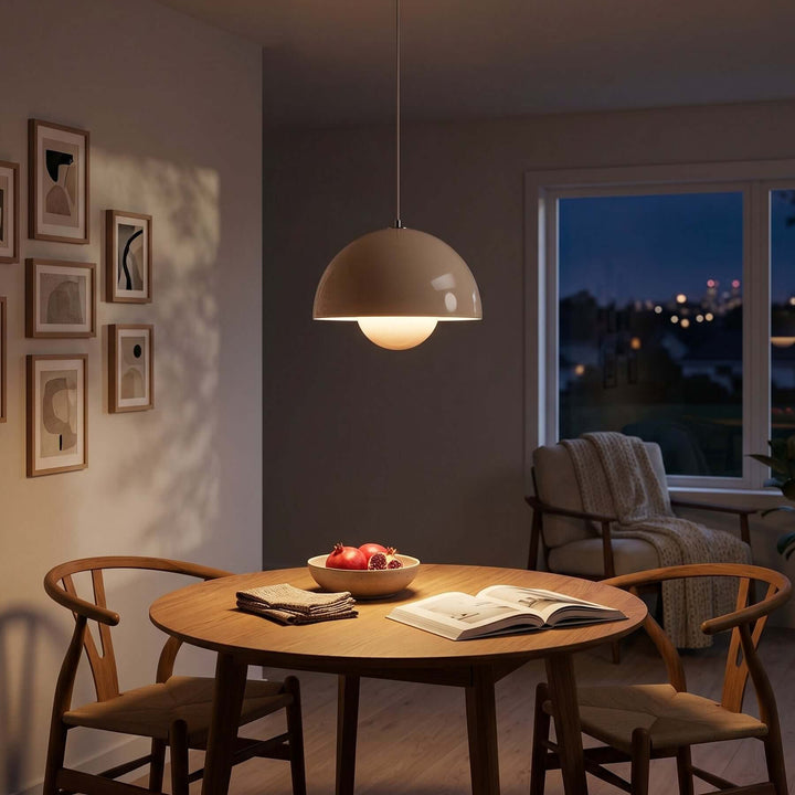 Beige gray Flowerpot pendant lamp shown above a dining table in an evening room.