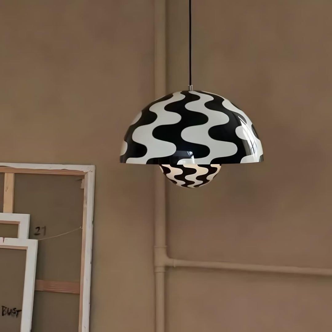 Black and white patterned Flowerpot pendant lamp shown in a room close-up.