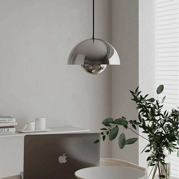 Chrome Flowerpot pendant lamp shown above a home office desk.