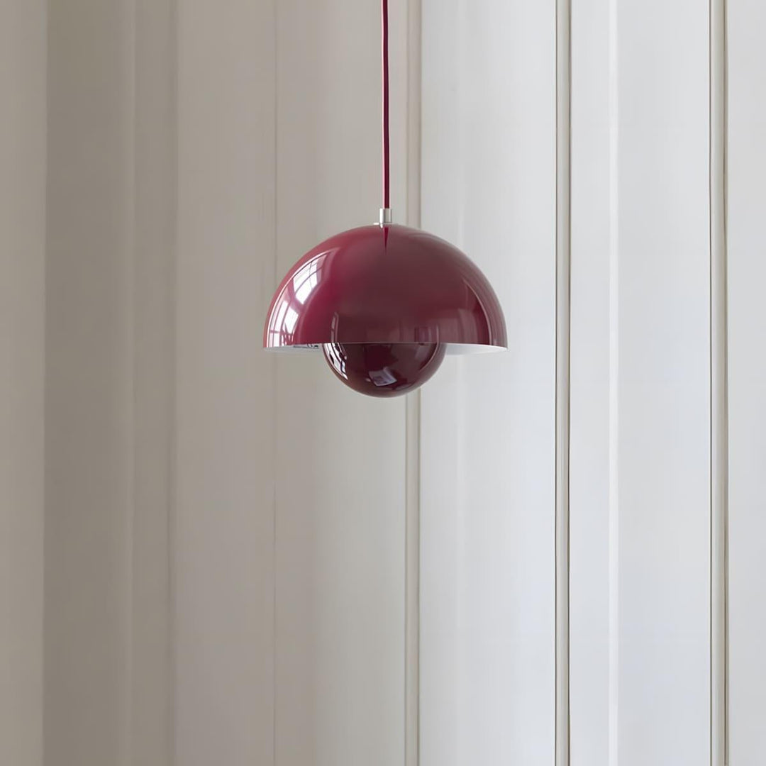 Ebony Flowerpot pendant lamp shown beside a window.