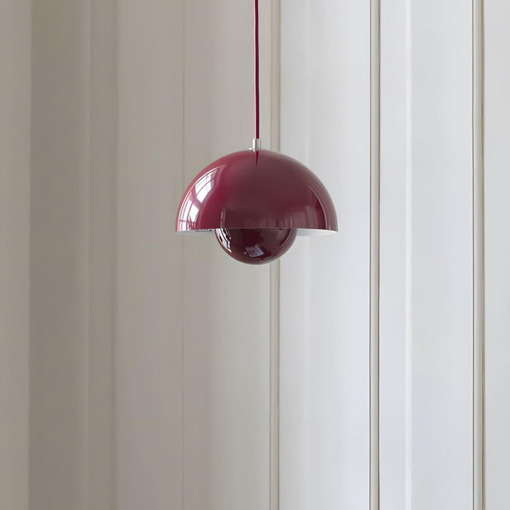 Ebony Flowerpot pendant lamp shown beside a window.