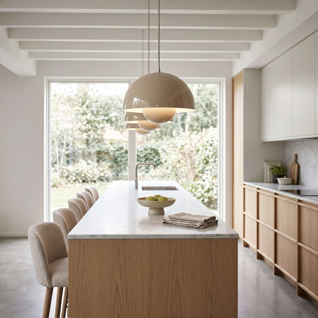Light sand Flowerpot pendant lamp shown above a kitchen island.