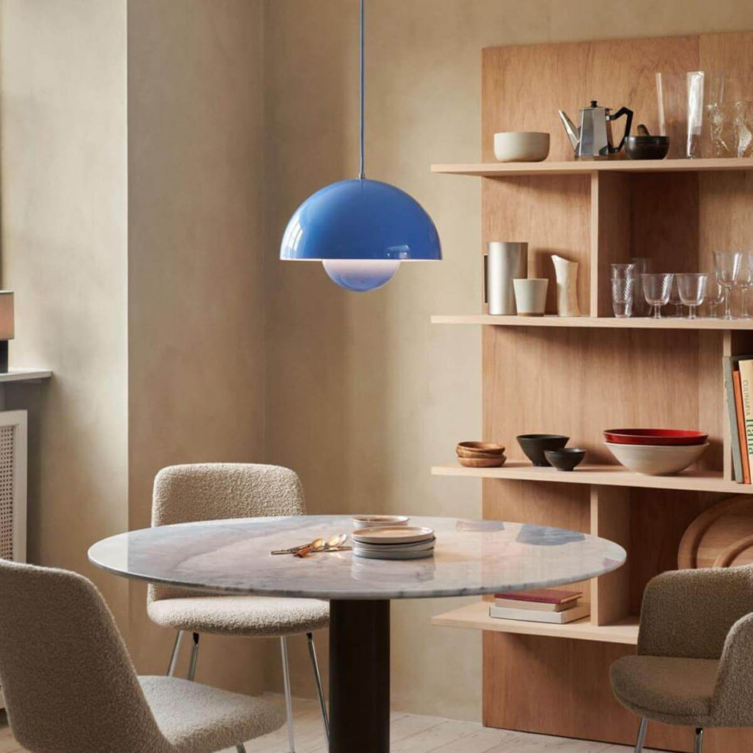 Sky blue Flowerpot pendant lamp shown above a round dining table.