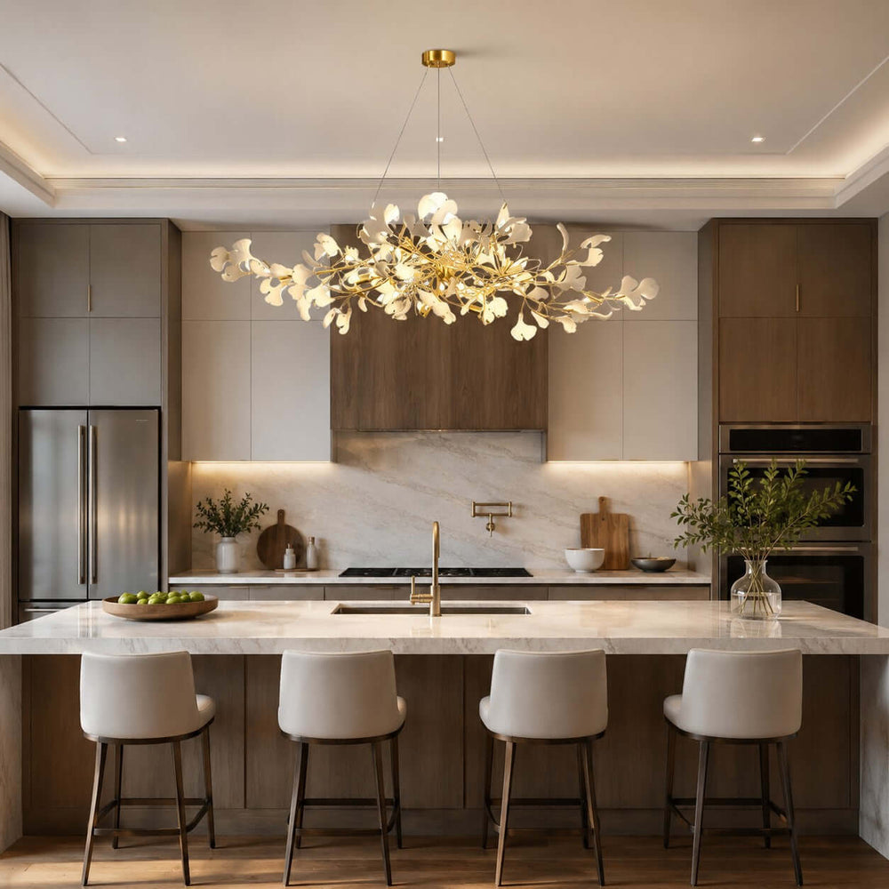 Ceramic leaf chandelier hanging above a kitchen island with white counter stools.