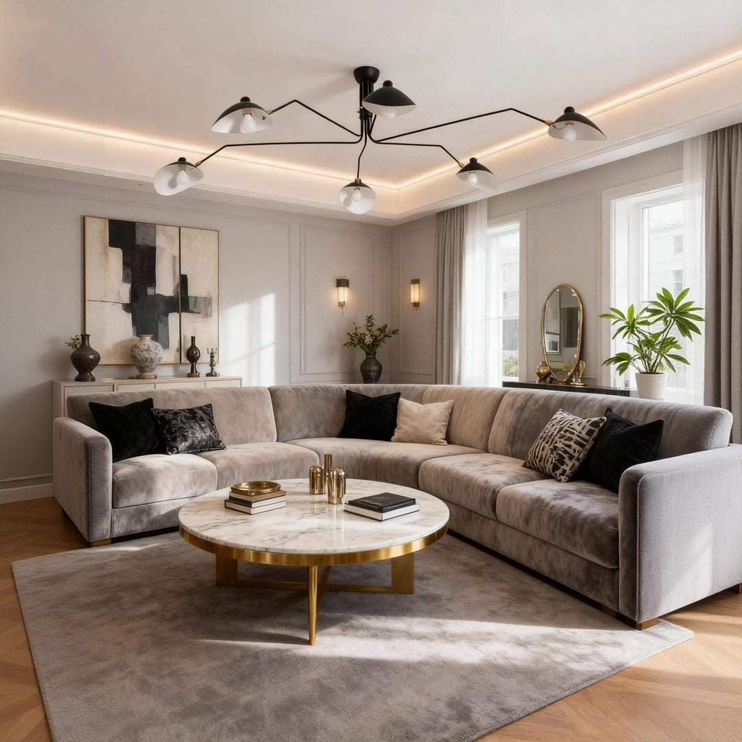 White six-light ceiling fixture above a sectional sofa in a living room.