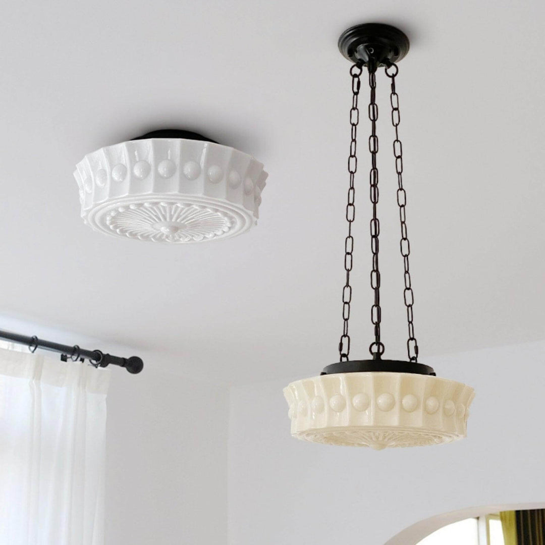 White flush mount and creamy pendant versions of the vintage patterned glass ceiling light