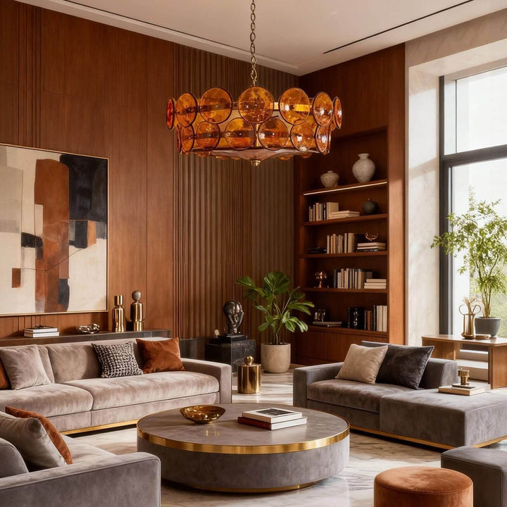 Vintage orange glass chandelier above a round coffee table in a modern living room