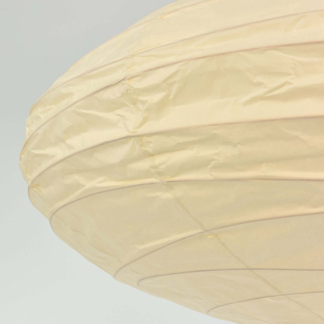 Close-up of the textured washi paper shade surface.