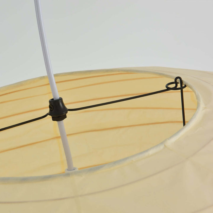 Close-up of the top frame and cord connection inside the washi paper shade.