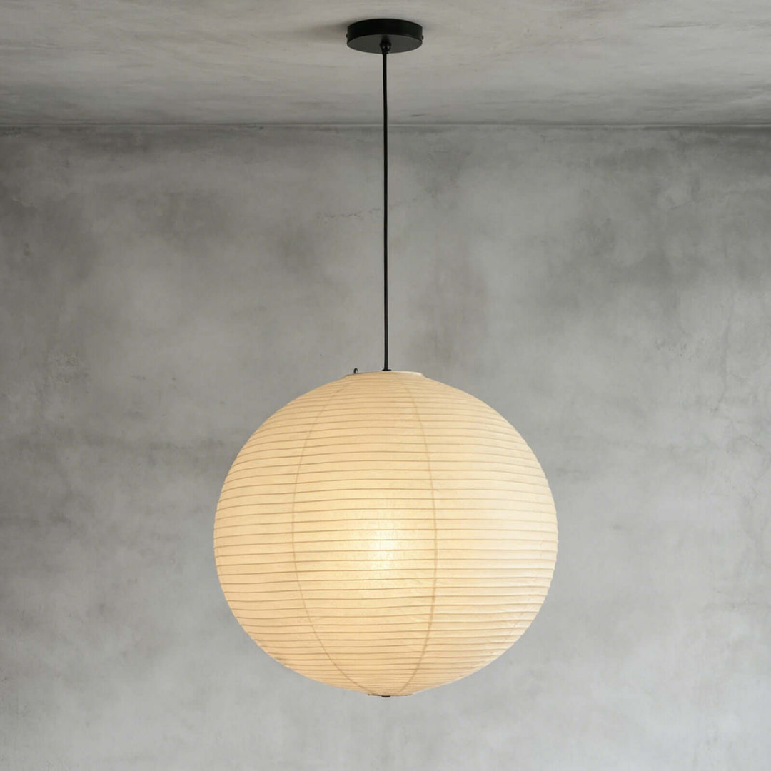 Washi paper globe pendant light with black cord and black ceiling canopy