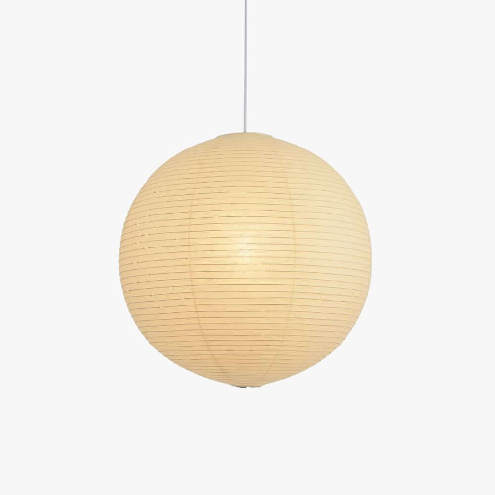 Washi paper globe pendant light with soft warm glow on a light background