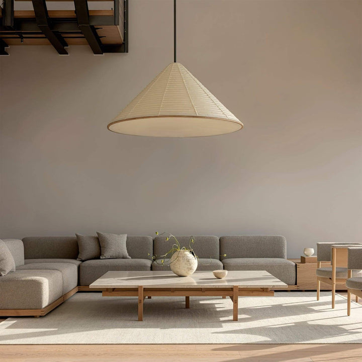 Large Washi paper pendant lamp centered above a low coffee table in a neutral modern living room