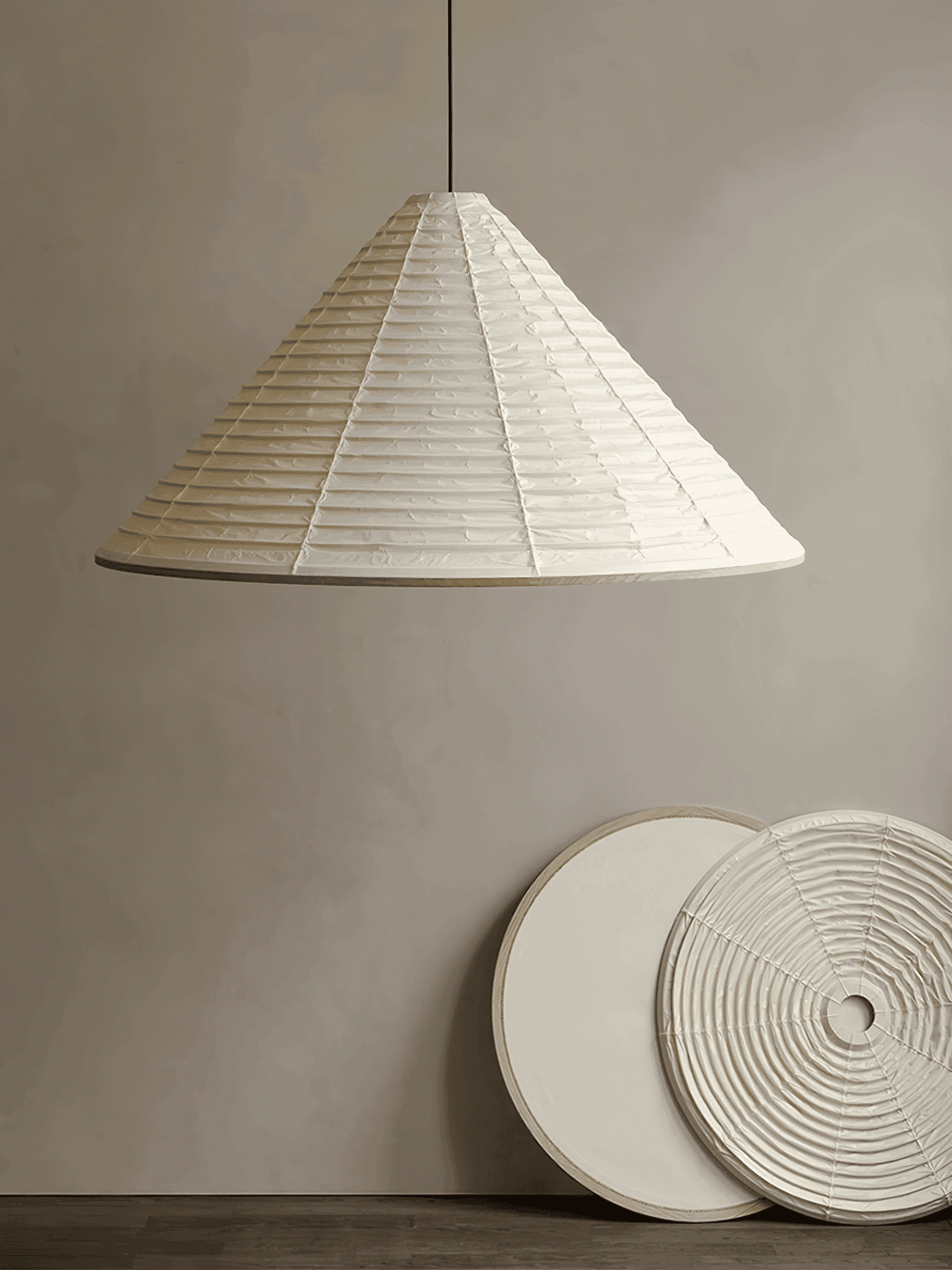 Washi paper pendant shade displayed with its circular bottom diffuser and ribbed frame construction