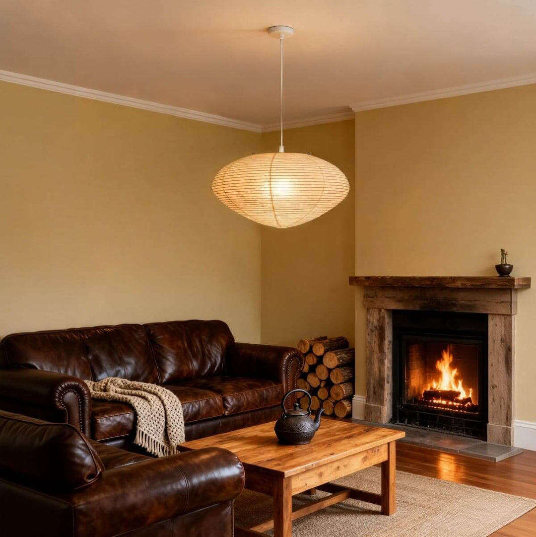 Washi paper pendant light in a living room with a fireplace.