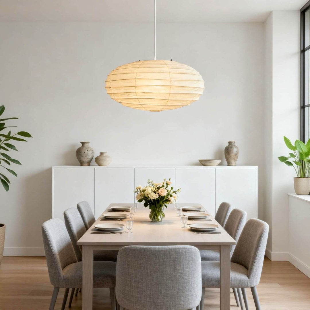 White cord washi paper pendant light above a formal dining table.