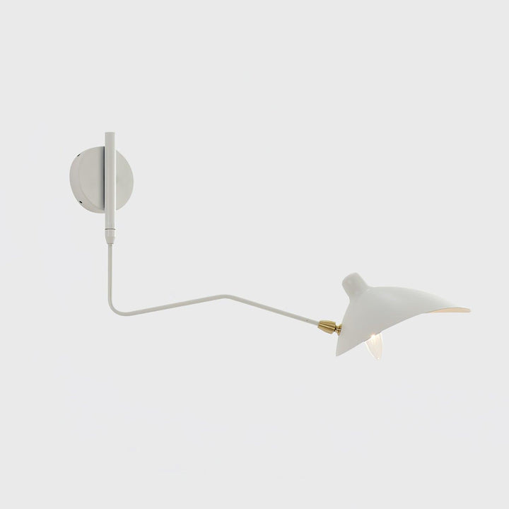White one-light swing arm wall sconce with a brass joint on a light background