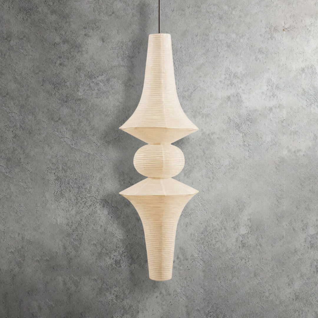 Unlit white Washi paper pendant light with a wide upper shade, rounded center and tapered lower section