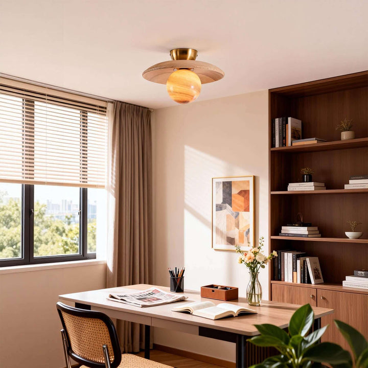 Beige wood Zolira ceiling light above a desk in a sunlit home workspace