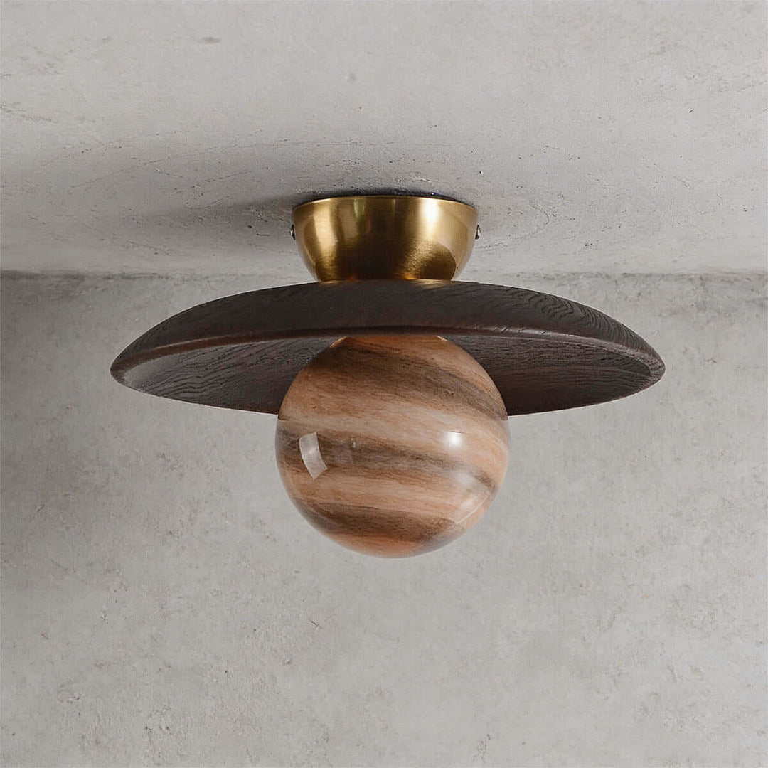 Unlit brown Zolira ceiling lamp showing its dark wood canopy, brass mount, and marbled glass globe